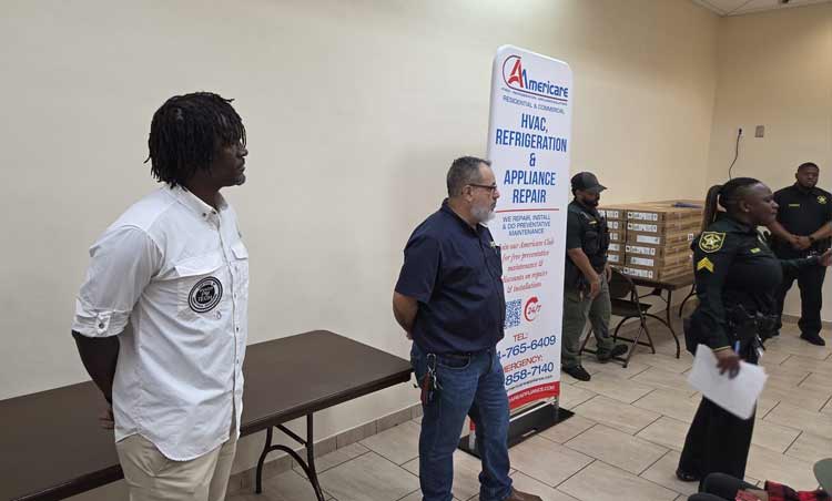 December-americare-donates computer to the youth
